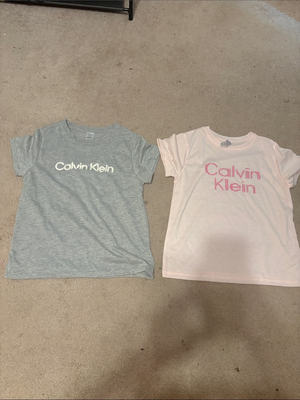 Calvin Klein womens Short Sleeve Logo Tees in Pink and Light Gray. Night shirts